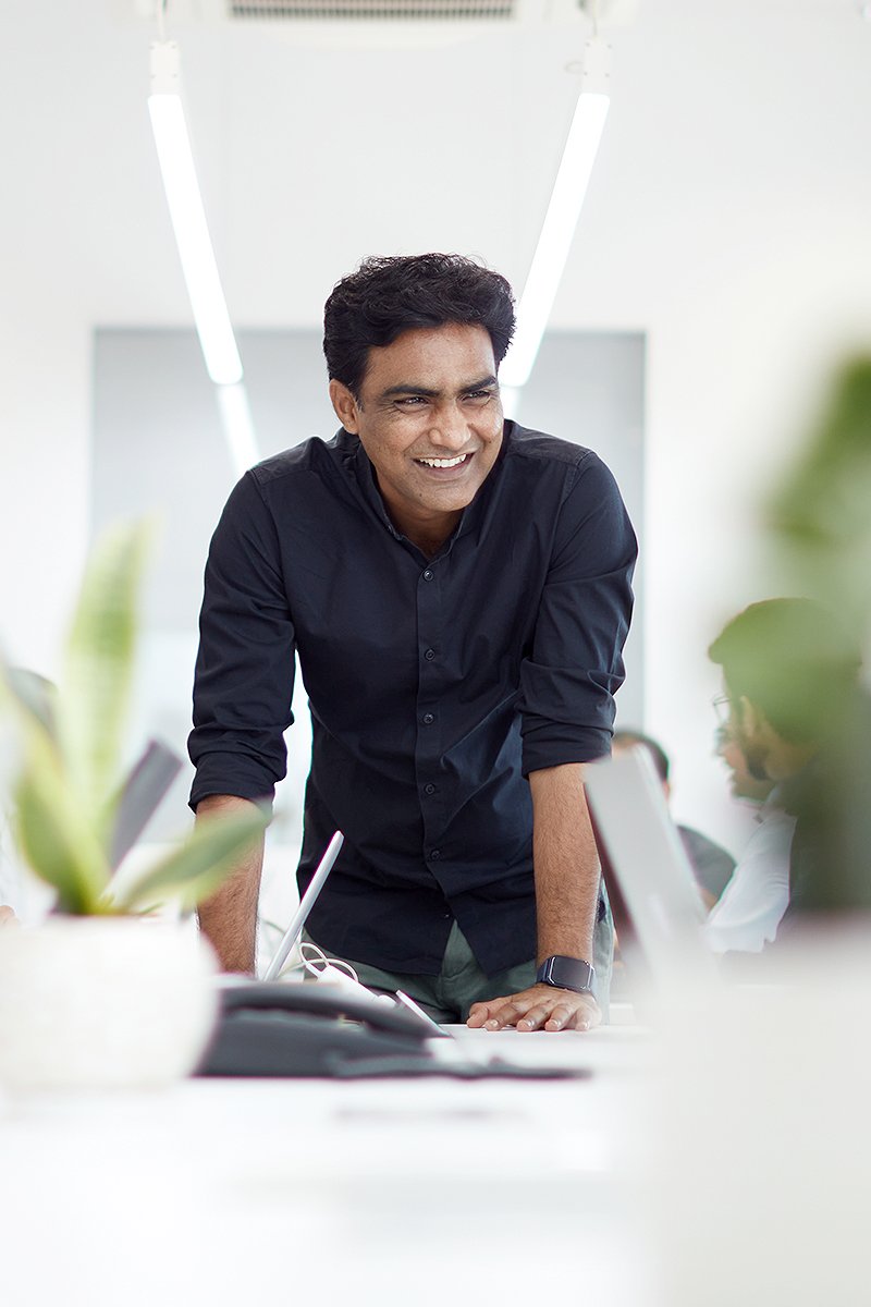 zero designs team members working in office space