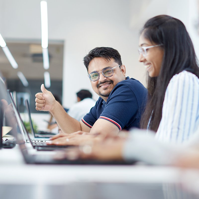 zero designs team members working in office space