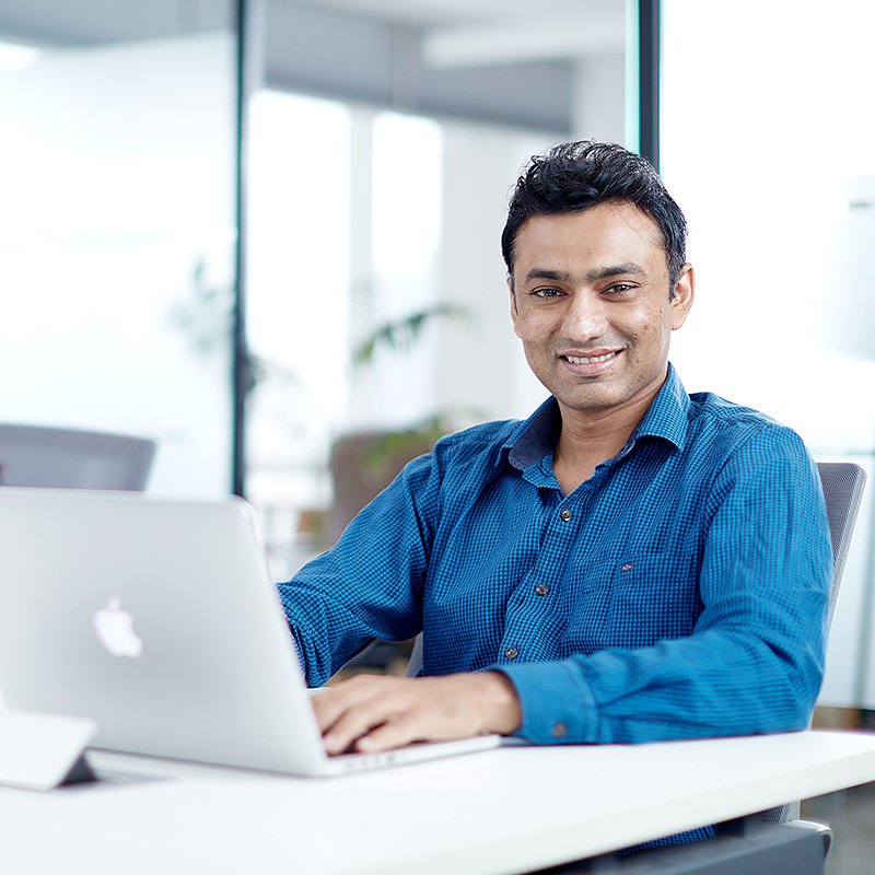 zero designs team members working in office space