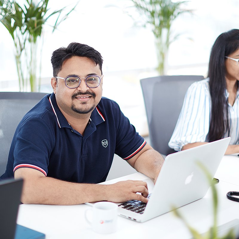 zero designs team members working in office space