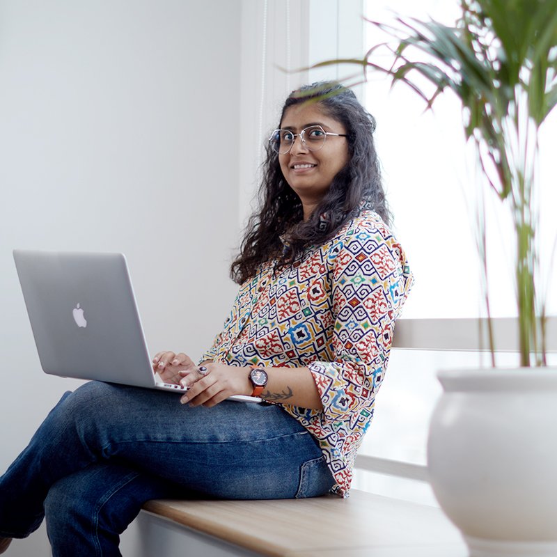 Zero Designs team members interacting in an office space